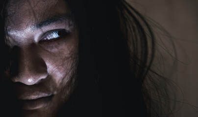 Scary ghost woman. Close up face of Asian woman ghost or zombie horror creepy scary have hair...