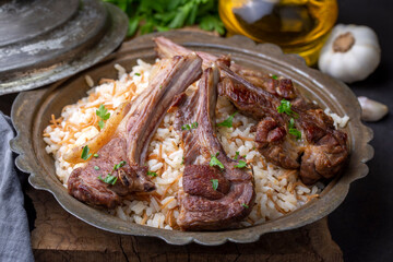 Grilled lamb chops on rice pilaf