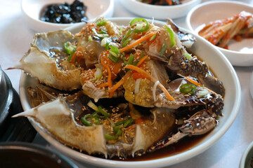 Korean traditional food eaten with fresh live crab seasoned with soy sauce