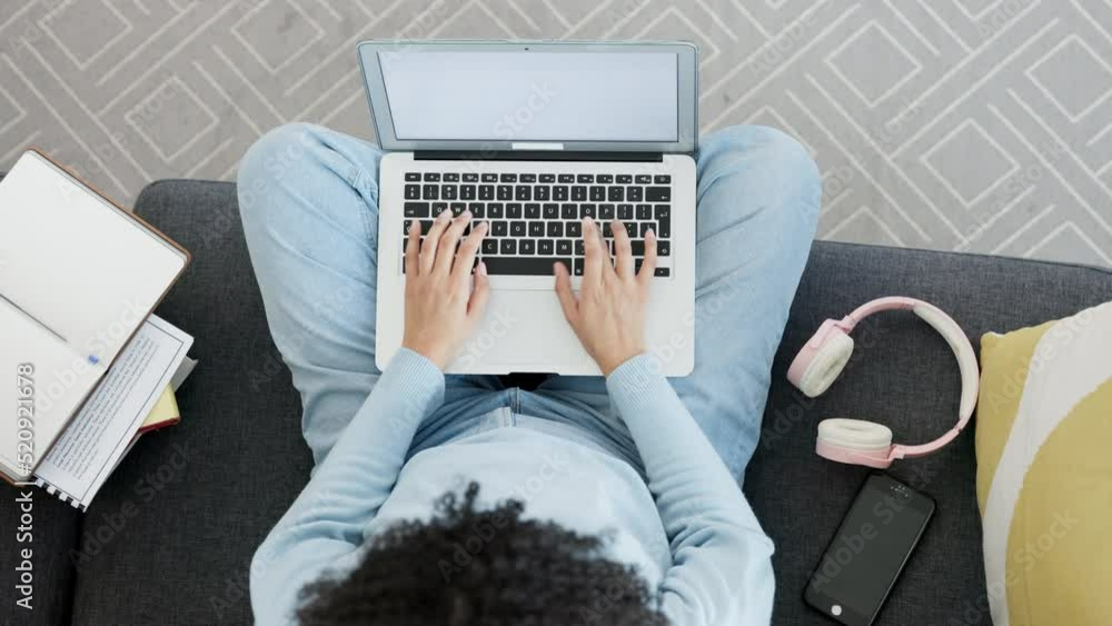 Poster Above student typing an online assignment on a laptop at home. Hands of writer or language interpreter writing an essay. Dedicated learner working on a digital school project before a deadline