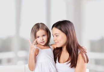 Happy family mother and child education. Mom with kid