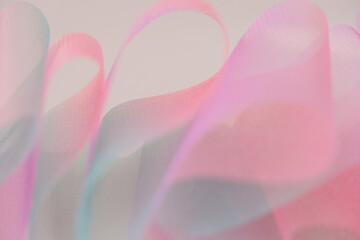 Fabric background.Wallpaper mauve phone.Tulle gradient texture.Shiny pink fabric with gradients....