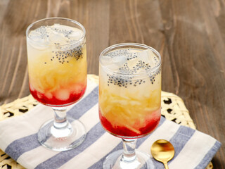 Es Blewah, contain slices of cantaloupe with syrup, basil seed and ice. Popular during Ramadhan in Indonesia. 