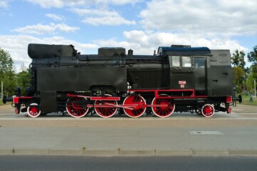 Fototapeta na wymiar old steam locomotive in the countryside