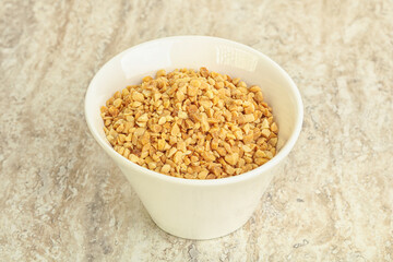 Crunched roasted peanut in the bowl