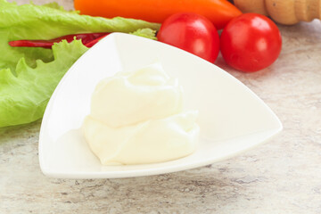 Organic mayonnaise sauce in the bowl