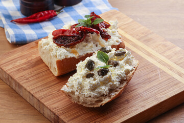 bruschetta with soft cheese capers and tomato
