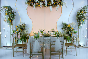 Wedding decorations. Wedding backdrop with flowers and Indonesian wedding decorations.