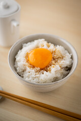 Tamagokake gohan, raw egg yolk on white rice, japanese breakfast