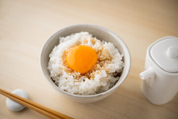 Tamagokake gohan, raw egg yolk on white rice, japanese breakfast