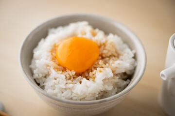 Tamagokake gohan, raw egg yolk on white rice, japanese breakfast
