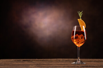 An Aperol Spritz with ice on the table