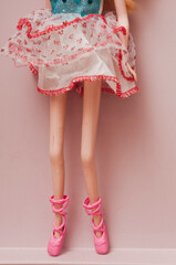 close up detail of  the legs of an anorexic doll - obrazy, fototapety, plakaty