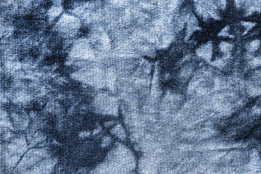 Monochrome deep blue tie-dye pattern, abstract fabric texture