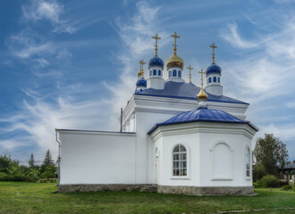 Ancient Church of the Ascension in the village of Bolshebrusyanskoye (Urals, Russia) in summer.