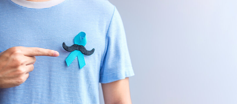 November Prostate Cancer Awareness month, Blue Ribbon with mustache for supporting people living and illness. Healthcare, International men, Father and World cancer day concept