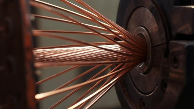 Modern cable manufacturing, cable factory. Copper cable production process in a modern factory. close-up. 4K. Cable twisting machine, industrial interior.3
