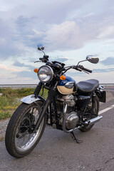 classic motorcycle on asphalt road