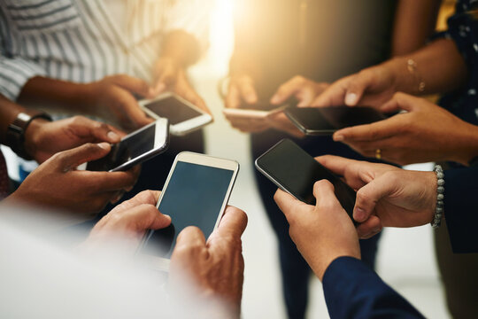 Business People Hands Typing On A Phone, Closeup Texting On Social Media Or Reading Emails Or Online News. Diverse Group Of Colleagues Social Networking, Looking At Copyspace Mobile Screens.