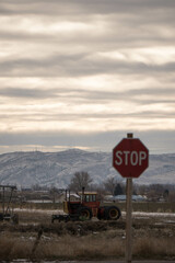 stop sign in snow mountains