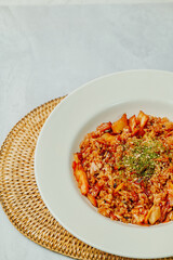 Korean food Kimchi Fried Rice Kimchibokkeumbap, Rice fried with finely chopped kimchi. Beef, pork, onions, green onions, and other vegetables may be added according to taste.