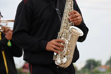 person playing saxophone