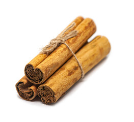 Ceylon cinnamon sticks on white background. H2 Sri Lankan authentic cinnamon. True cinnamon sticks. Pure Ceylon cinnamon. Close up.