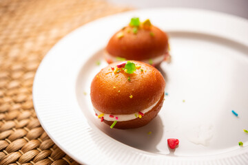 Malai Chop or Cream sandwich made using filling Rasgulla or Gulab jamun sweet is a Bengali sweet