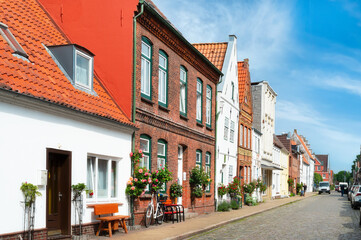 Historic houses in the idyllic old town of Friedrichstadt, Germany
