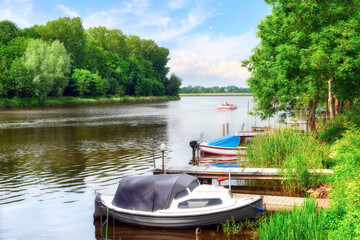 Obraz premium Boats on the canal in Friedrichstadt, Germany