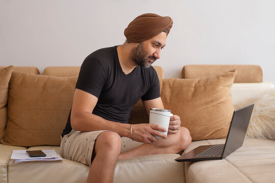 Sikh man freelancing from home office
