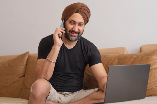 Sikh man freelancing from home office