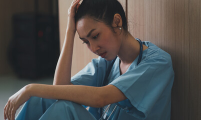 concept of medical care Asian female doctor gesturing tired exhausted medical personnel assistant hospital patient