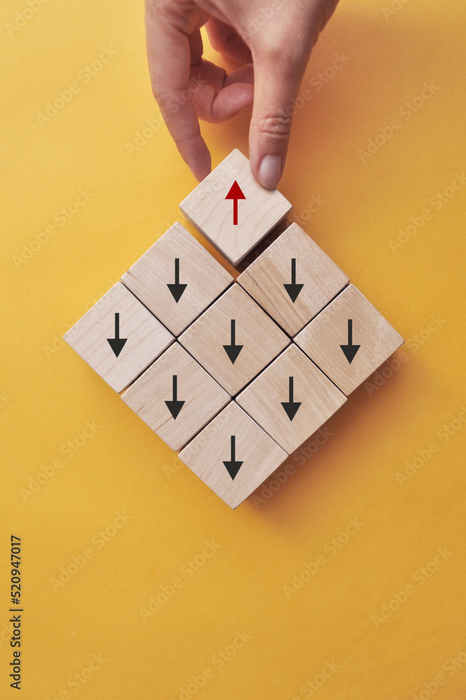 Poster many arrows point in one direction, and one moves in the other direction. a symbol of choosing a dif