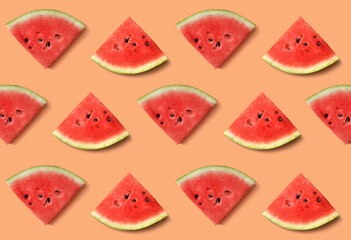 Texture of watermelon slices on an orange background