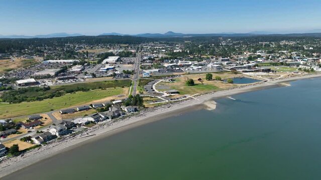 Aerial view of the Oak Harbor water front starting with Windjammer Park and ending with wealthy waterfront estates.