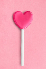 Lollipop on pink background