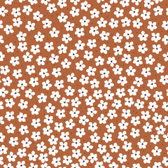 Simple vintage pattern. small white flowers. brown background. Fashionable print for textiles and wallpaper.