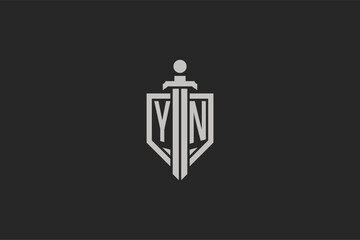 Letter YN logo with shield and sword icon design in geometric style - obrazy, fototapety, plakaty