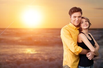 Happy satisfied smiling young couple family man woman hug rest together at sunrise over sea beach ocean outdoor seaside in summer day