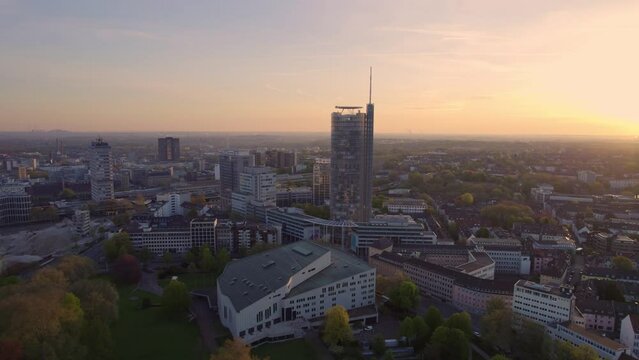 Beautiful aerial shot of Essen city in Germany at sunset. RWE Tower on cityscape skyline