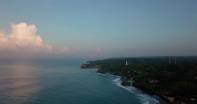 bird's eye view of java island coastline at sunrise