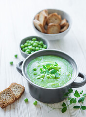 Fresh vegetable soup made of green peas