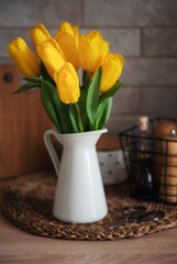 Beautiful tulip flowers  on table at kitchen