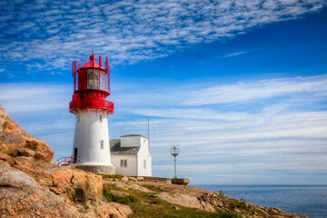 Fototapeta na wymiar Lighthouse at Lindesnes, the Southernmost Point of the Norwegian Mainland