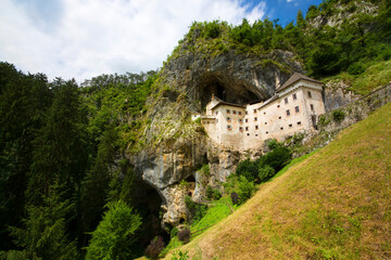 Fototapeta na wymiar The Cave with the Renaissance Predjama Castle, Slovenia