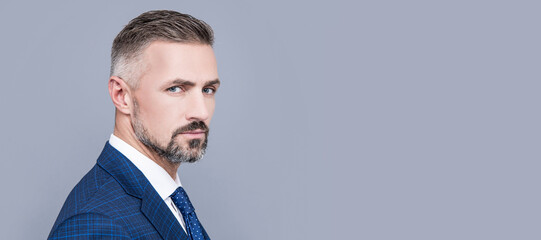 unshaven businessman man in businesslike suit crossed hands, male portrait. Man face portrait,...