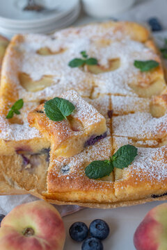 Delicious home made peach pie with blueberries and ricotta