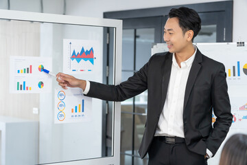 Business man making a presentation at office. Business executive delivering a presentation