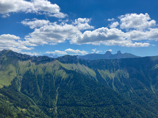 Montreux, Switzerland: 01-08-2022: Panorama of the Switzerland Alpine mountains. Ridges, peaks and lake are visible in the background. Beautiful view in the French Canton.
